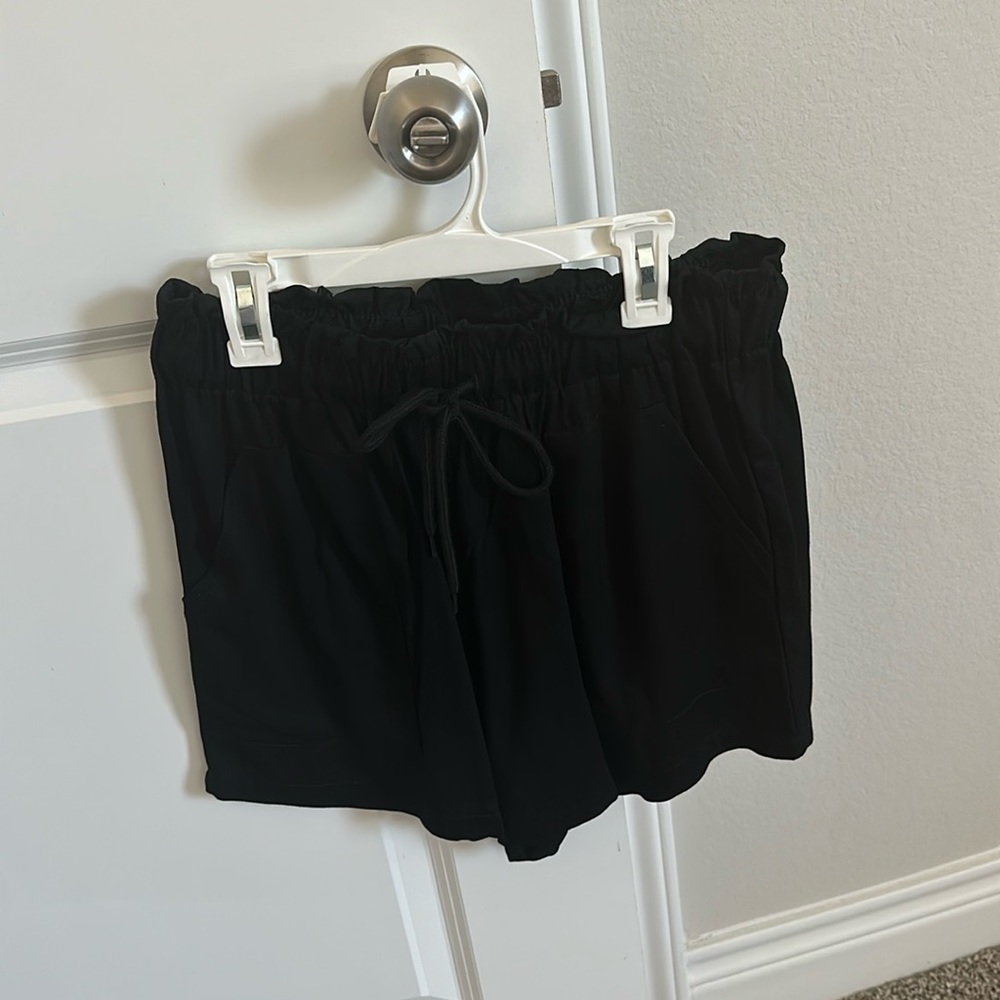 Black shorts in size medium. Never worn